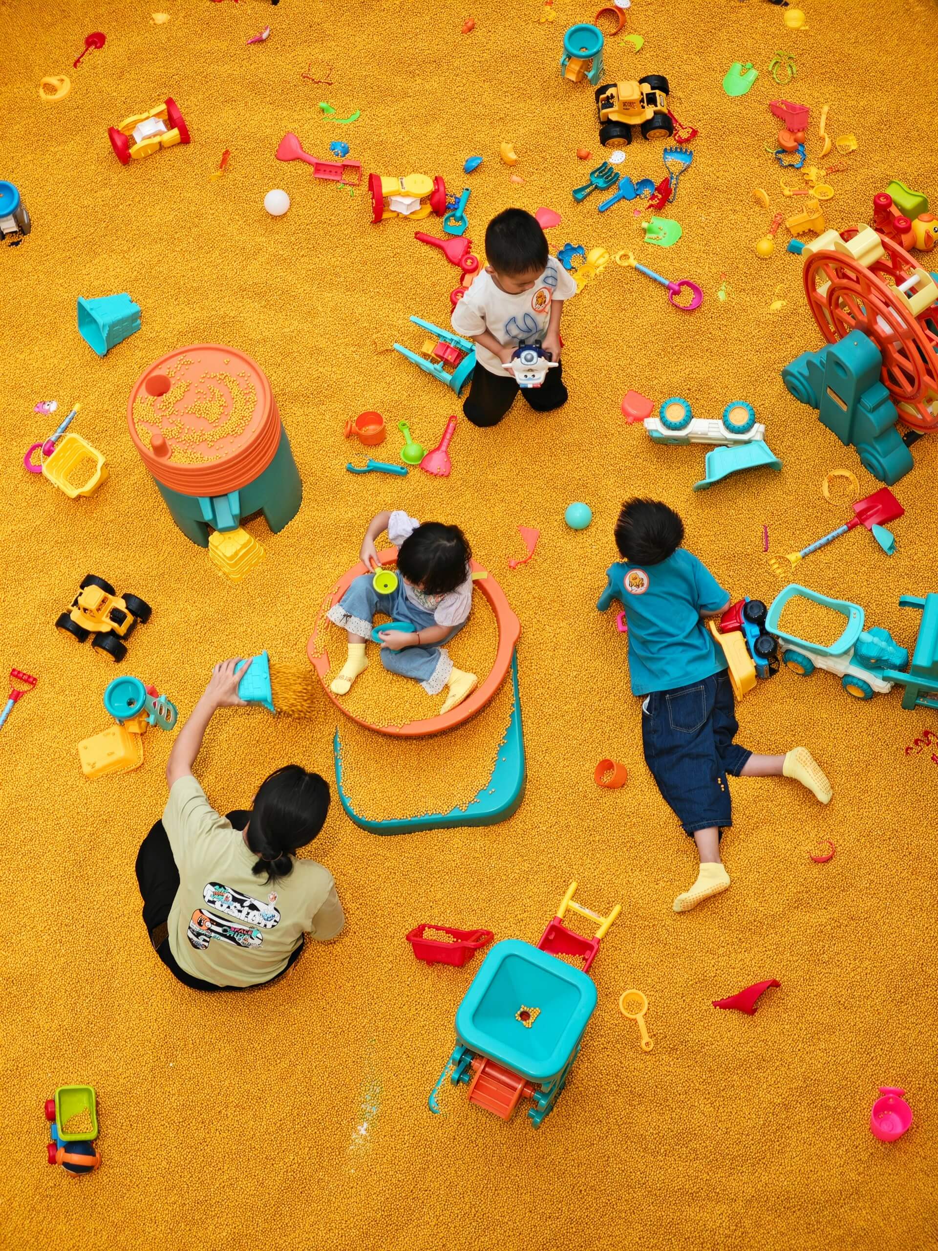 Children learning and playing together in a bright Kindy4Kids classroom