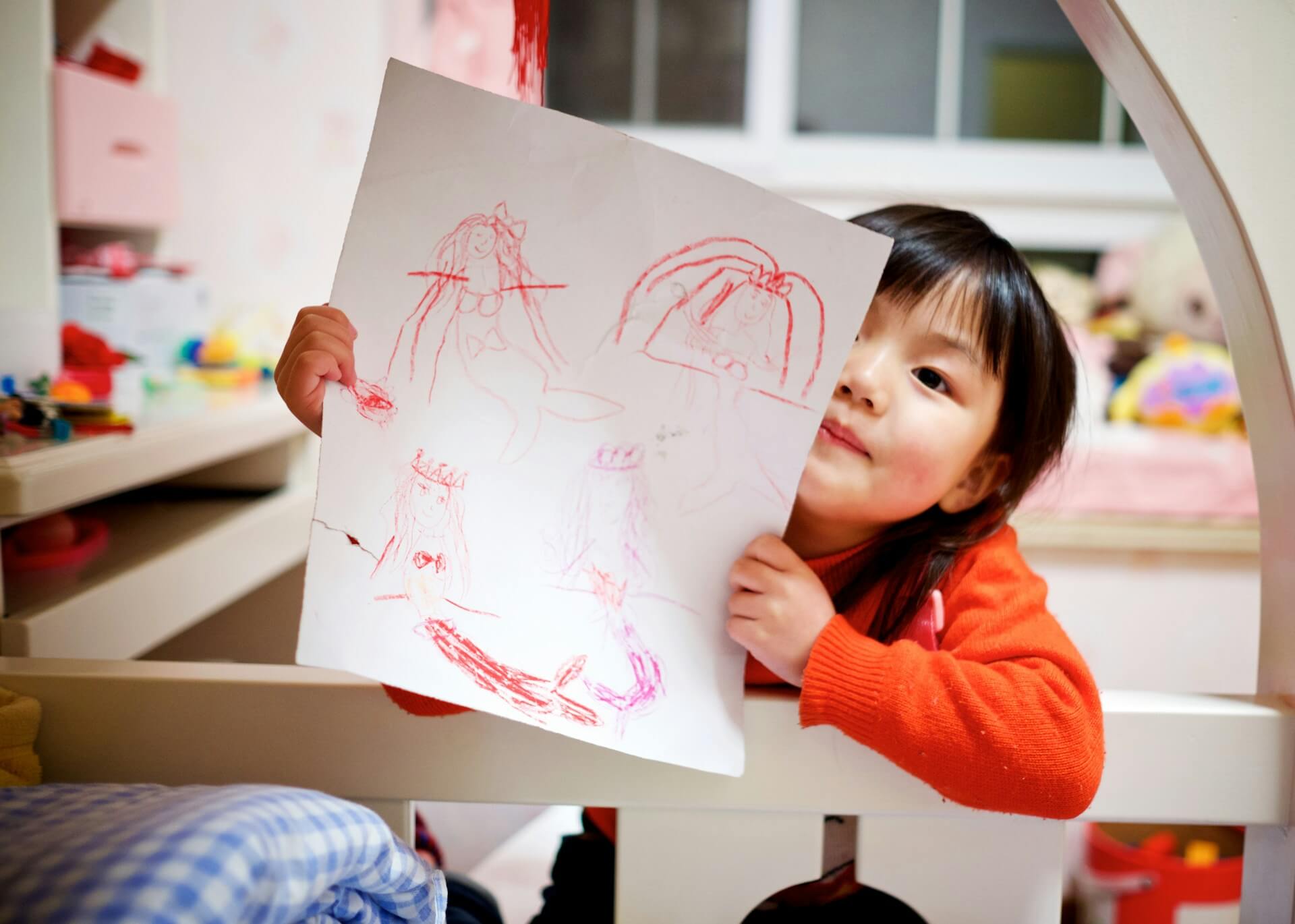 Children exploring imaginative play with animals and blocks