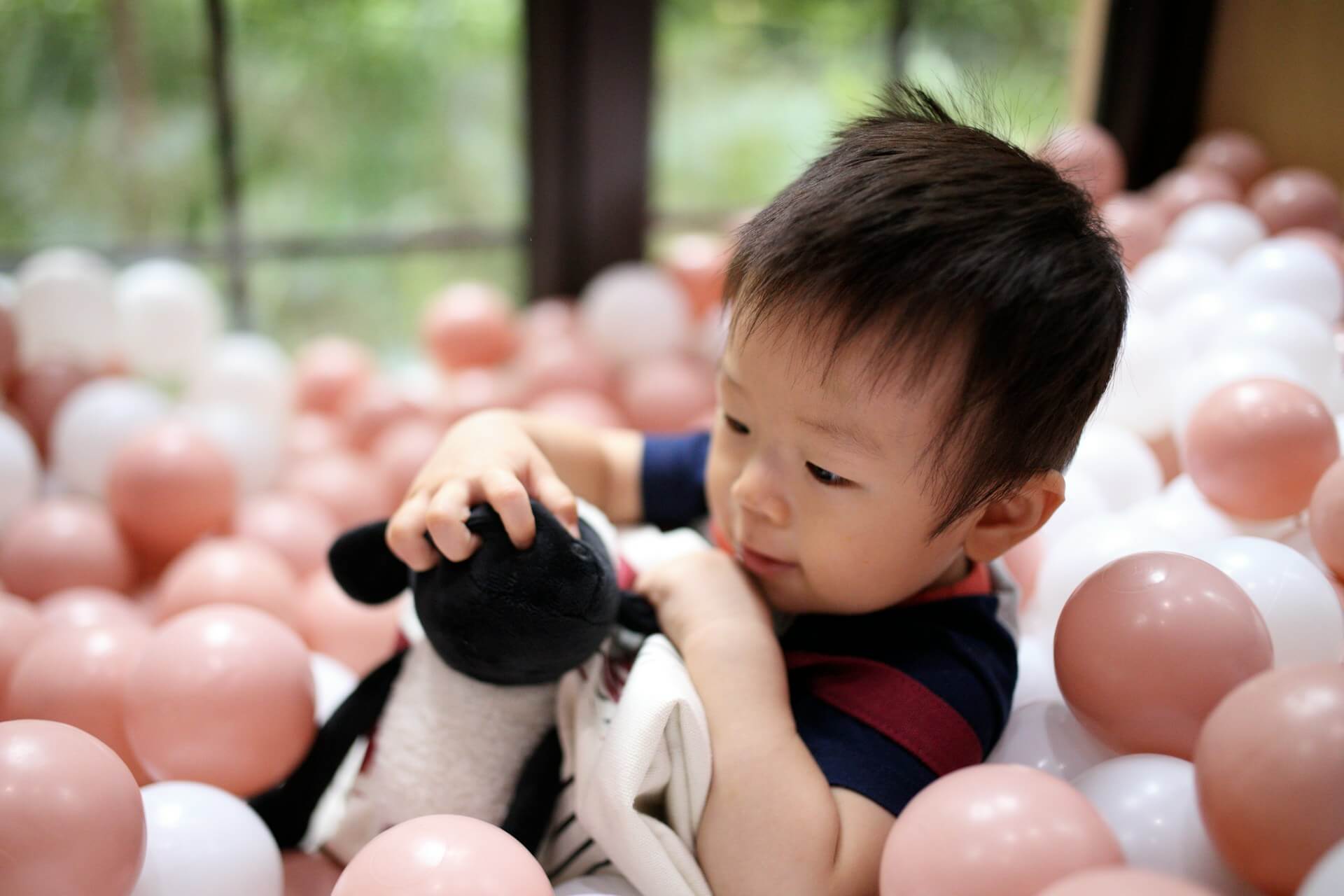 Child enjoying a playful balloon experience